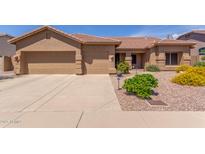 Charming single-story home featuring a two-car garage and beautifully landscaped front yard at 17836 N 52Nd Pl, Scottsdale, AZ 85254