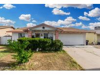 Charming single-story home with a well-maintained front yard and attached two-car garage at 4513 W Yucca St, Glendale, AZ 85304