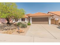 Charming single-Gathering home with a well-maintained yard and a classic Southwestern style at 19443 N 36Th St, Phoenix, AZ 85050