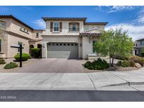 Elegant two-story home with a private driveway and a two-car garage at 214 W Beverly Ln, Phoenix, AZ 85023