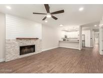 Spacious living room with modern finishes and open floor plan at 7700 E Gainey Ranch Rd # 102, Scottsdale, AZ 85258