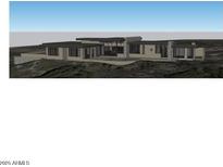 Modern home with stone accents, dark trim windows, and flat roof is set on a desert landscape at 9804 E Running Deer Trl, Scottsdale, AZ 85262