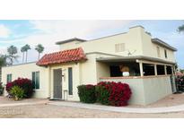 Charming home with red tile roof, desert landscaping, and inviting curb appeal at 14254 N Boxwood Ln # 158B, Fountain Hills, AZ 85268