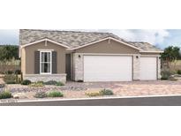 Charming single-Gathering home with a stone-accented facade and three-car garage on a beautifully landscaped lot at 18189 W Hess St, Goodyear, AZ 85338