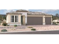 Charming single-story home featuring a two-car garage and neutral color palette at 18195 W Hess St, Goodyear, AZ 85338