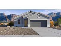 Charming single-story home with a neutral color palette, complemented by a low-maintenance desert landscape at 5530 E Mearn Rd, San Tan Valley, AZ 85140