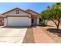 Charming single-story home with a well-manicured front yard and a two-car garage at 1116 S 53Rd St, Mesa, AZ 85206