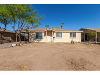 Quaint single-story home featuring a neutral color palette and low maintenance desert landscaping at 6139 N 31St Dr, Phoenix, AZ 85017
