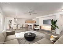 Open-concept living area showcases a modern design with tile floors, neutral decor, and lots of space at 999 S Sabino Dr, Gilbert, AZ 85296