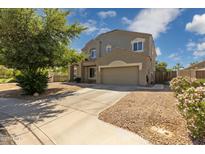 Charming two-story home with a two car garage and desert landscaping at 1014 S Porter St, Gilbert, AZ 85296