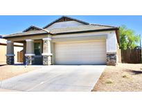 Charming single-story home with a two-car garage and low maintenance desert landscaping at 2745 W Jessica Ln, Phoenix, AZ 85041