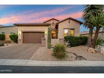 Beautiful exterior view of a single-story house with well-maintained landscaping, stone accents, and a brick driveway at 1641 N Channing --, Mesa, AZ 85207