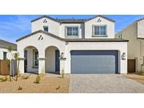 Beautiful two-story home boasting a well-kept front yard and a spacious two-car garage at 17837 W Mission Ln, Waddell, AZ 85355