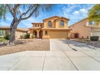 Charming two-story home featuring a well-maintained yard and inviting curb appeal at 2306 W Spur Dr, Phoenix, AZ 85085