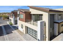 Beautiful two-story home with a balcony, large garage, and modern architectural design at 1 Easy St # 4, Carefree, AZ 85377