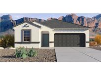 Charming single-story home with a two-car garage and desert landscaping at 10610 W Bloch Rd, Tolleson, AZ 85353