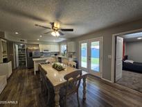 Bright living space that flows into a modern kitchen and dining area at 1904 E Jarvis Ave, Mesa, AZ 85204