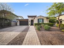 Charming single-story home with a well-manicured front yard and paved driveway at 20458 W Briarwood Dr, Buckeye, AZ 85396