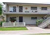 Charming two-story apartment building with a welcoming entrance and well-maintained landscaping at 5550 N 12Th St # 15, Phoenix, AZ 85014