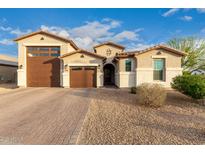 Charming single-Gathering home showcasing a tile roof, neutral stucco, and a spacious three-car garage at 7829 W Warner St, Phoenix, AZ 85043