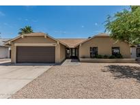 Charming single-story home features a well-manicured yard and inviting entrance at 1019 W Mohawk Ln, Phoenix, AZ 85027