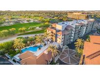 Beautiful aerial view of the condo complex with pool and golf course access at 15802 N 71St St # 657, Scottsdale, AZ 85254