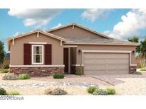 Charming single-story home featuring a neutral color palette, stone accents, a two-car garage, and desert landscaping at 2625 N 195Th Dr, Buckeye, AZ 85396