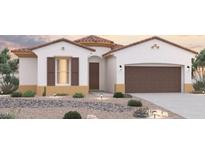 Charming single-story home featuring a two-car garage and low-maintenance desert landscaping at 8488 S 168Th Ave, Goodyear, AZ 85338