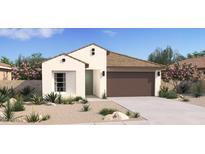 Inviting single-story home with a two-car garage, neutral-toned exterior, and desert landscaping at 23404 W Burton Ave, Buckeye, AZ 85326