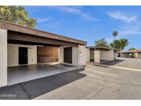Well-maintained carports featuring ample parking space and convenient access to residential units at 4549 W Mclellan Rd, Glendale, AZ 85301