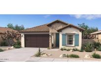 Charming single-story home with stone accents, desert landscaping, and a welcoming facade at 23417 W Burton Ave, Buckeye, AZ 85326