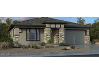 Charming single-story home featuring stone accents, neutral colors, and a two-car garage at 20712 E Via Del Oro --, Queen Creek, AZ 85142