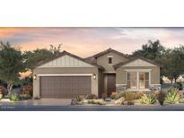Charming single-story home with a two-car garage, neutral paint, and desert landscaping at 5768 N Oak Creek Dr, Eloy, AZ 85131