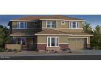 Two-story home with brick accents, light-colored exterior, and a two-car garage, providing a blend of classic and modern design at 8426 W Solano Dr, Glendale, AZ 85305