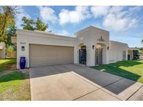 Charming home with a private courtyard entrance and attached two-car garage at 8935 N 82Nd St, Scottsdale, AZ 85258