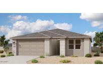 Charming single-story home showcasing a neutral color palette, desert landscaping, and a two-car garage at 2300 E Spur Dr, San Tan Valley, AZ 85140