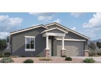 Charming single-story home featuring a neutral-toned exterior, covered entryway, and attached two-car garage at 2382 E Homesteader Rd, San Tan Valley, AZ 85140
