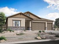 Charming single-story home with stone accents, three-car garage and desert landscaping at 281 W Flax Dr, San Tan Valley, AZ 85140