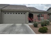 Charming single-story home with desert landscaping and a neutral color palette for a welcoming curb appeal at 3117 S Signal Butte Rd # 492, Mesa, AZ 85212