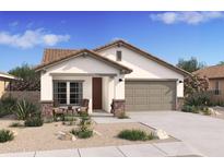 Charming single-story home featuring a well-manicured desert landscape, covered entryway, and attached two-car garage at 42405 W Peters Dr, Maricopa, AZ 85138