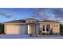 Beautiful single-story home with a two-car garage and decorative brick accents at 5311 N 88Th Ave, Glendale, AZ 85305