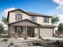 Charming two-story home with a welcoming front porch, neutral color palette, and desert landscape at 820 W Riparian Dr, San Tan Valley, AZ 85140