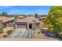 Beautiful single-Gathering home with a well-manicured yard and a two car garage at 3498 E Ravenswood Dr, Gilbert, AZ 85298