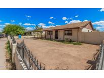 Charming single-story home featuring a low-maintenance front yard and classic architecture at 5529 W Virginia Ave, Phoenix, AZ 85035