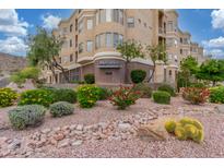 Beautiful condo exterior with well-maintained landscaping and colorful desert plants in a modern community at 9820 N Central Ave # 224, Phoenix, AZ 85020