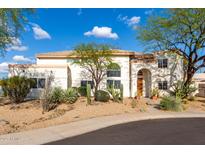 Attractive two-story home featuring a well-manicured desert landscape at 1625 E Monte Cristo Ave, Phoenix, AZ 85022