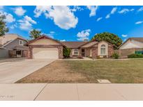 Charming single-story home with a well-manicured lawn and inviting curb appeal at 3756 E Clovis Ave, Mesa, AZ 85206