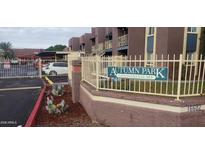 Autumn Park Condominiums features well-maintained community, desert landscaping, and gated entry at 16602 N 25Th St # 223, Phoenix, AZ 85032