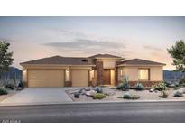 Beautiful single-story home featuring a three-car garage and desert landscaping at 22660 E Pegasus Pkwy, Queen Creek, AZ 85142