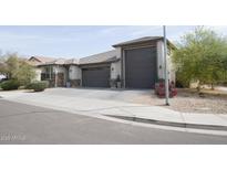 Charming single-Gathering home boasting a three-car garage, neutral colors, and tasteful landscaping at 3911 S 78Th Ln, Phoenix, AZ 85043